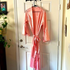 Pink silly looking with flair sleeves and long belt beautiful when ironed